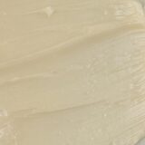 Close-up of a bowl filled with a smooth, white substance, showcasing the luxurious texture of 'le fruit de Albius.'