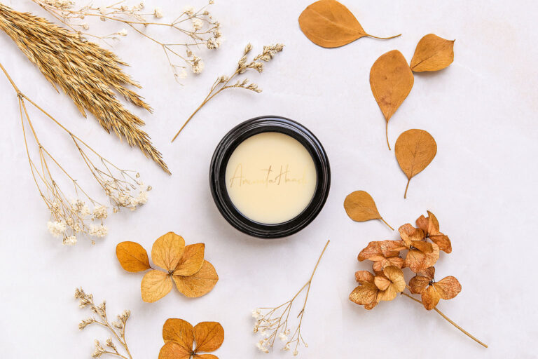 ORI vegan skincare face balm on dried fall floral flatlay