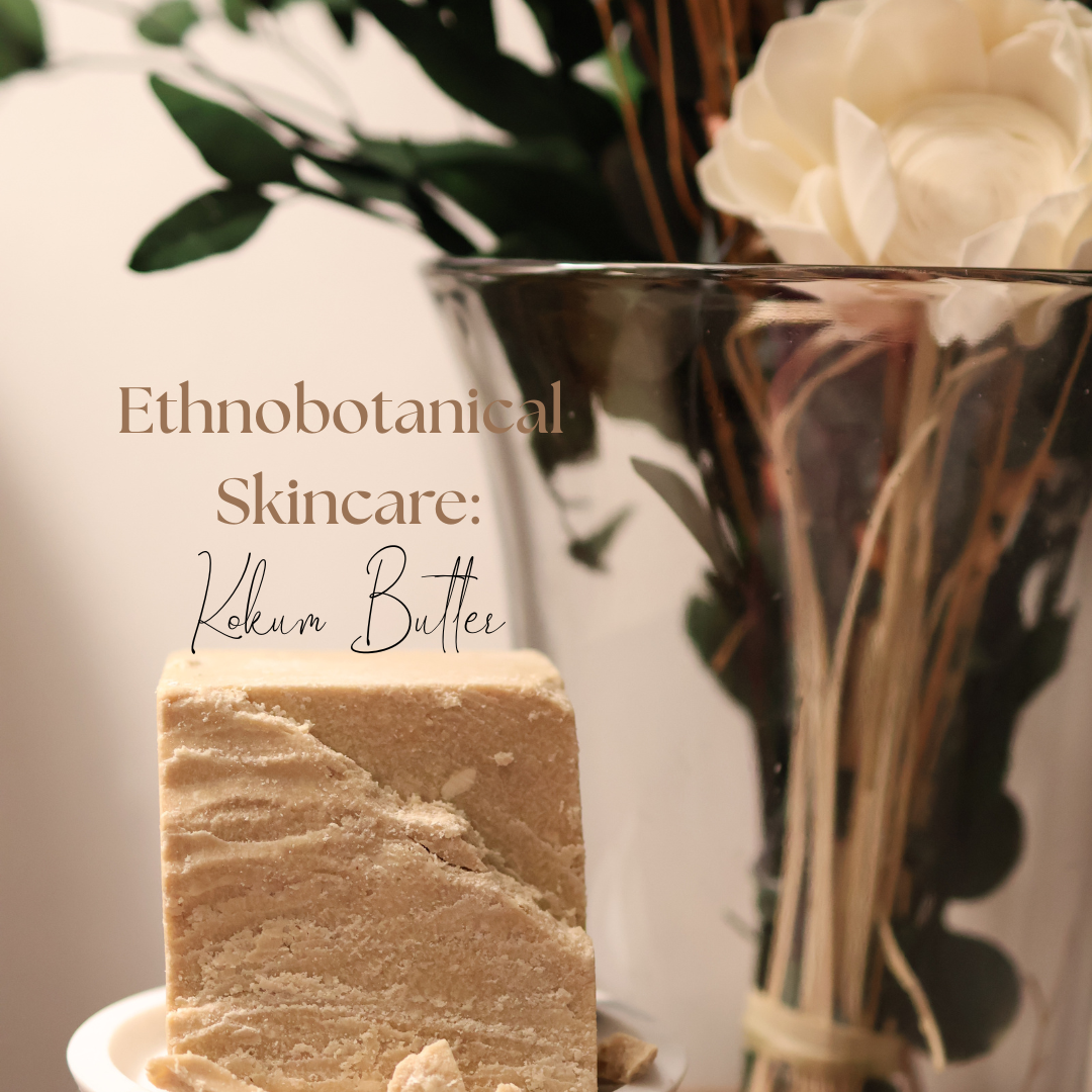 Ethnobotanical skincare. Wild-harvested kokum butter beside dried florals.